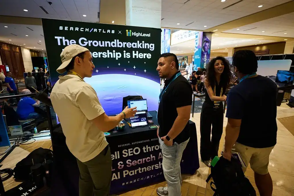 Attendees talking at the HighLevel LevelUp Summit exhibitor floor -GoHighLevel LevelUp Summit 2026